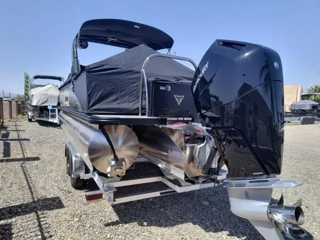 Slide: The Image of 2024 Tahoe Cascade Quad Lounge Windshield 25 FT interior with luxurious seating. - 15