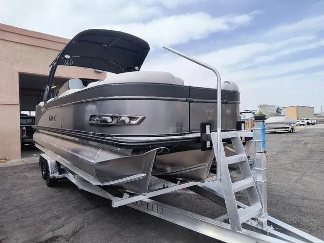 Slide: The Image of 2024 Tahoe Cascade Quad Lounge Windshield 25 FT pontoon boat interior. - 3