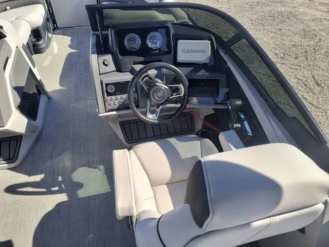 Slide: The Image of Interior of 2024 Tahoe Cascade Quad Lounge Windshield 25 FT boat with plush seating. - 8