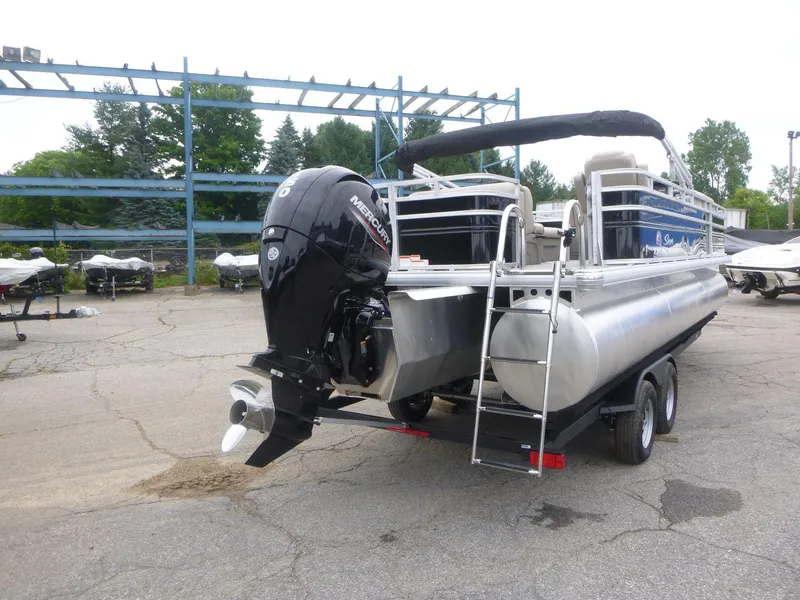 Slide: The Image of 2024 Sun Tracker Sportfish 24 XP3 pontoon boat with Mercury outboard motor. - 5