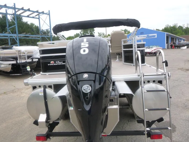 Slide: The Image of 2024 Sun Tracker Sportfish 24 XP3 pontoon boat with powerful outboard motor. - 6
