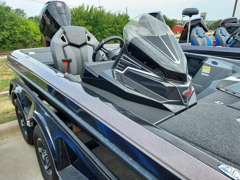 Slide: The Image of 2023 Ranger Z521R bass boat with sleek design and modern features. - 3