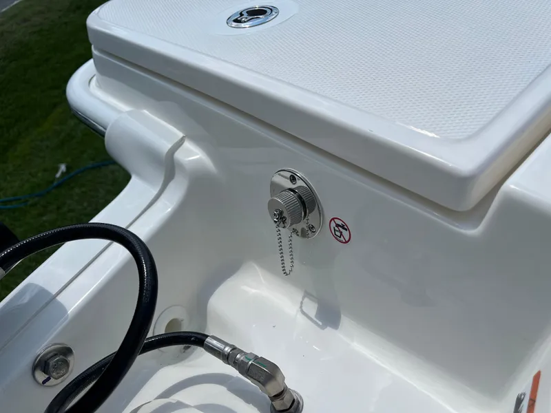 Slide: The Image of Close-up of 2024 Boston Whaler 250 Dauntless boat's utility compartment. - 11