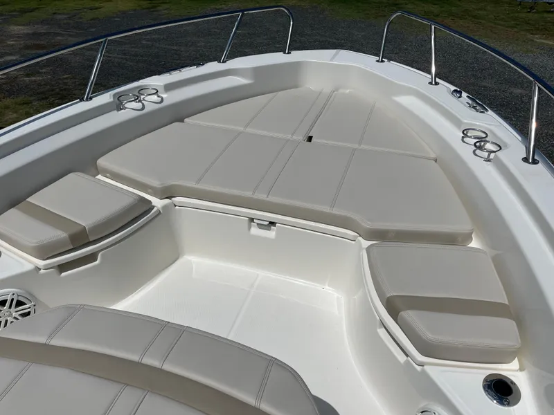 Slide: The Image of 2024 Boston Whaler 250 Dauntless boat with spacious bow seating area. - 16