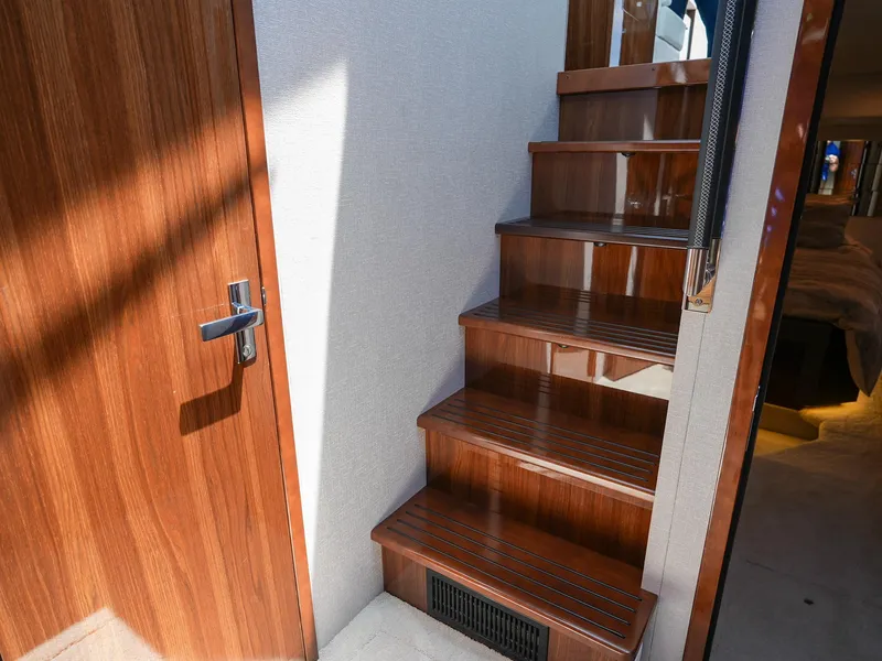 Slide: The Image of 2021 Cruisers Yachts 50 Cantius interior wooden staircase and door - 40