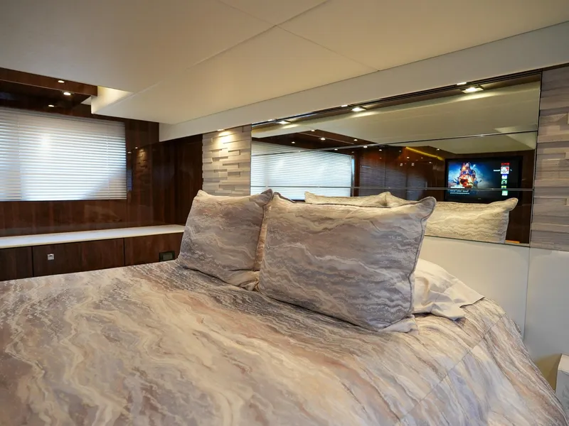 Slide: The Image of Luxurious bedroom interior of 2021 Cruisers Yachts 50 Cantius with modern decor and TV. - 43