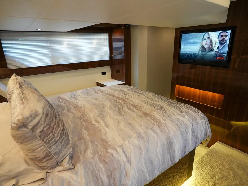 Slide: The Image of Luxurious bedroom in 2021 Cruisers Yachts 50 Cantius with TV and modern decor. - 47