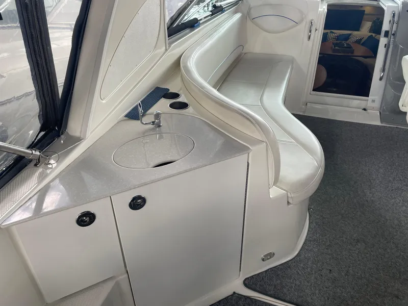 Slide: The Image of 2008 Bayliner 340 interior with sink and seating area. - 10