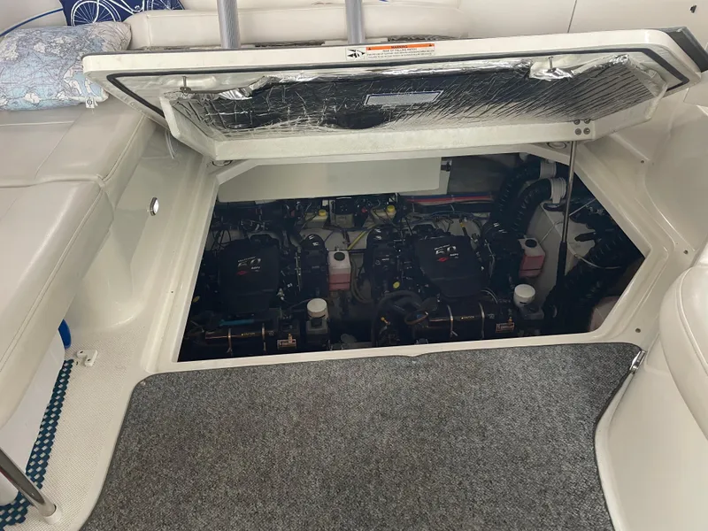 Slide: The Image of Engine compartment of a 2008 Bayliner 340 boat with twin engines. - 33