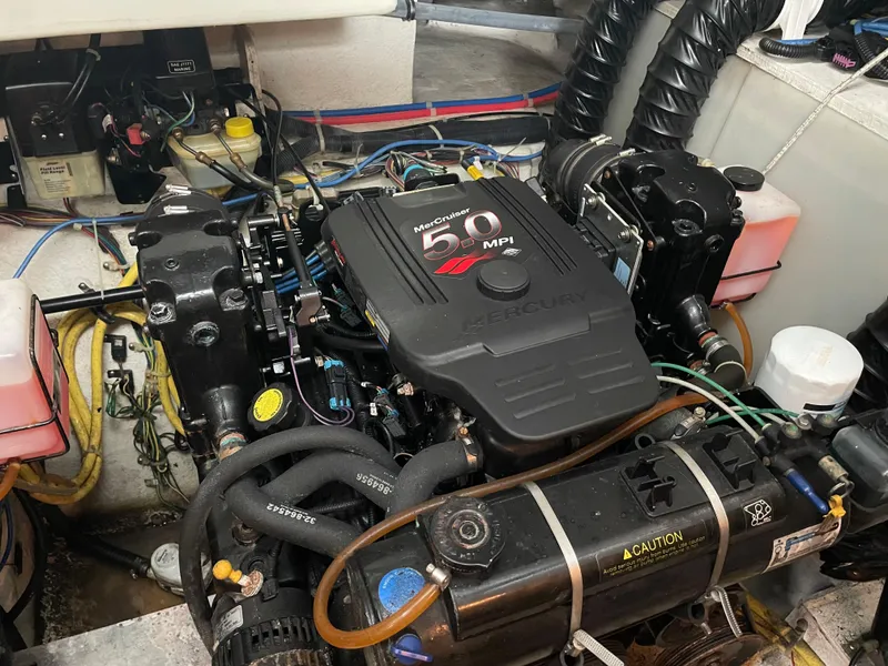 Slide: The Image of 2008 Bayliner 340 engine compartment with MerCruiser 5.0 MPI engine. - 35