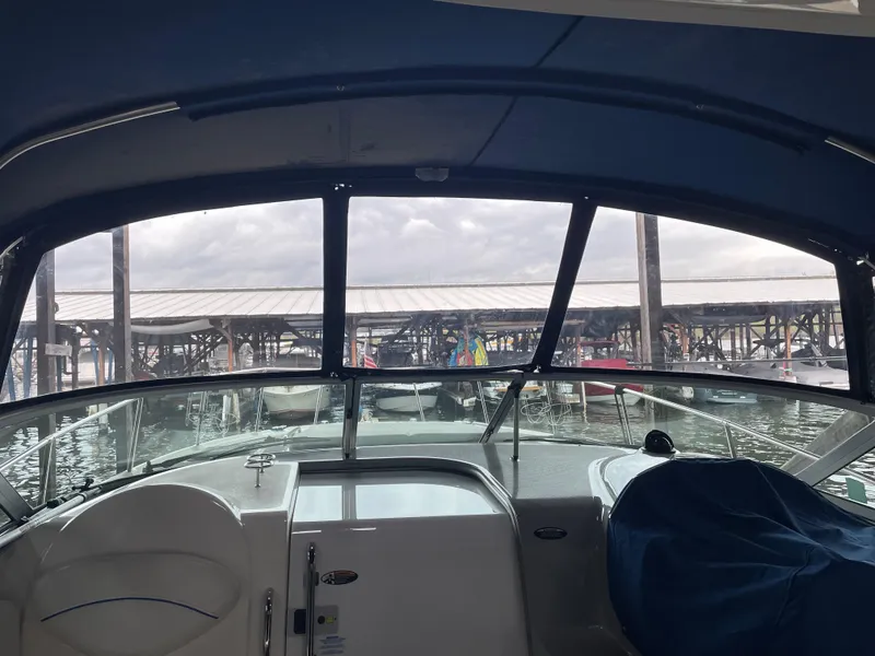 Slide: The Image of Interior view of 2008 Bayliner 340 boat docked at marina. - 42