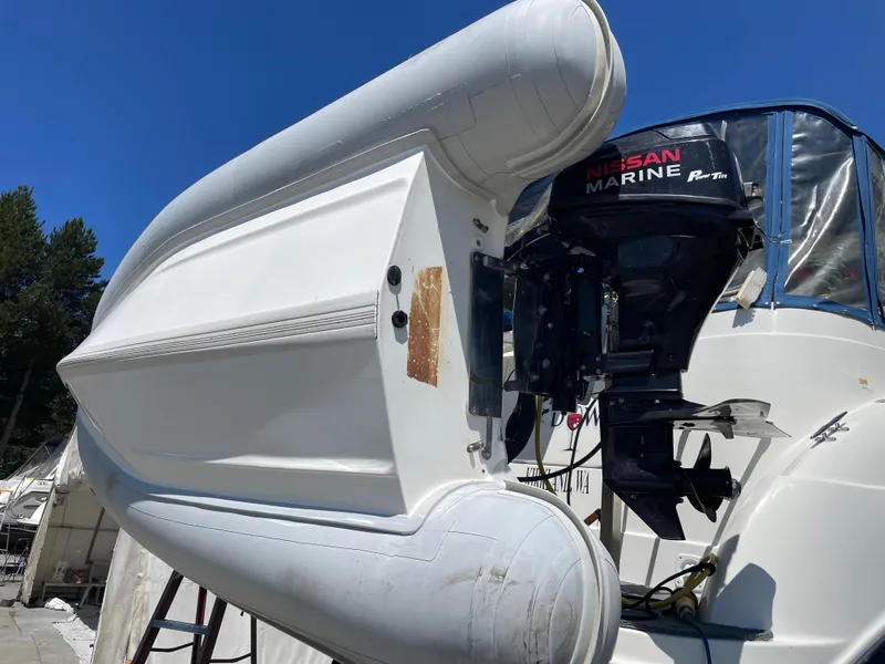 Slide: The Image of Bayliner 340 boat with Nissan Marine outboard motor, 2008 model. - 45