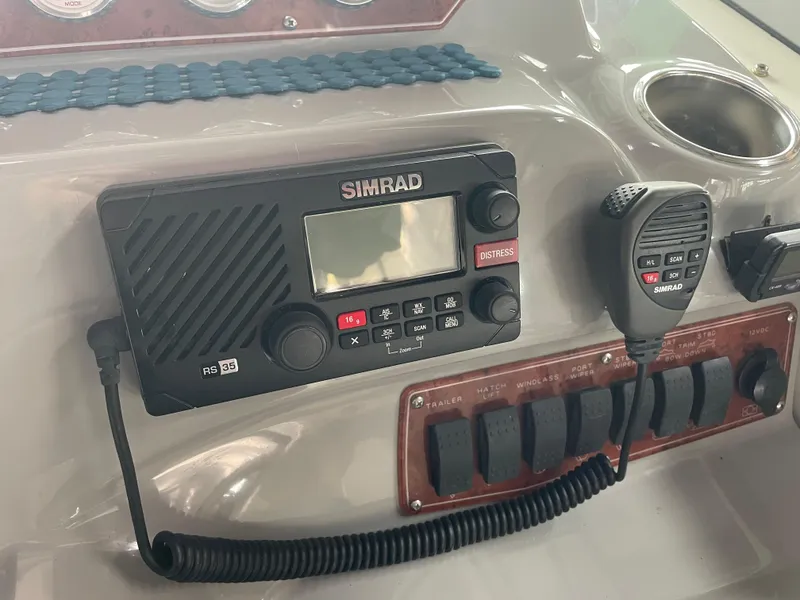 Slide: The Image of Simrad radio system on 2008 Bayliner 340 boat dashboard. - 7