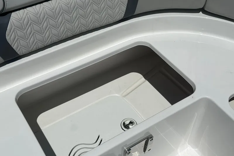 Slide: The Image of Interior storage compartment of 2026 Hurricane SunDeck 2400 OB boat. - 37