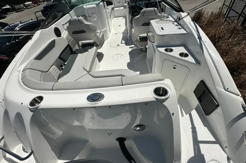 Slide: The Image of 2026 Hurricane SunDeck 2400 OB boat interior with spacious seating and modern amenities. - 40