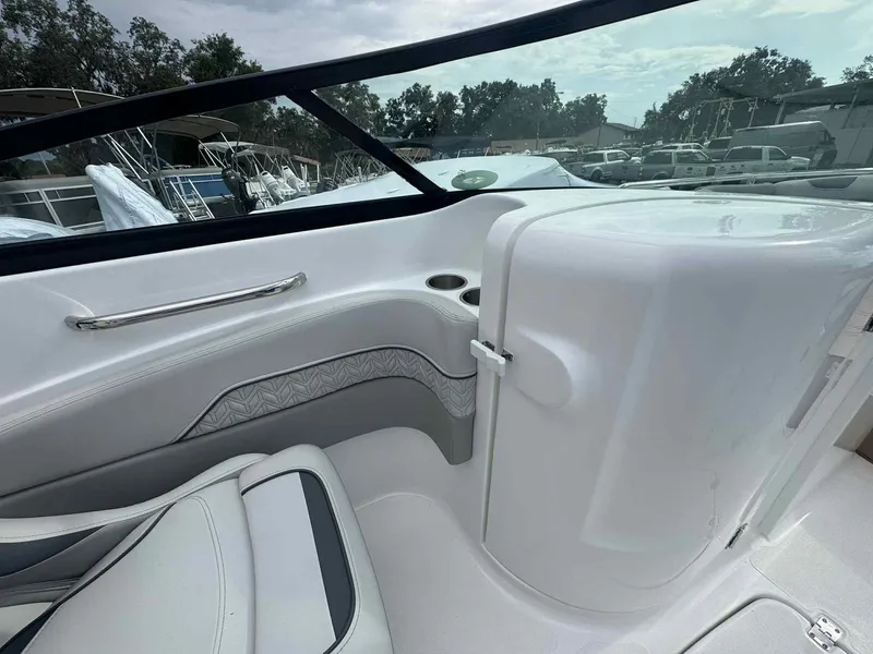 Slide: The Image of 2025 Hurricane SunDeck 2400 OB interior with sleek seating and modern design. - 8