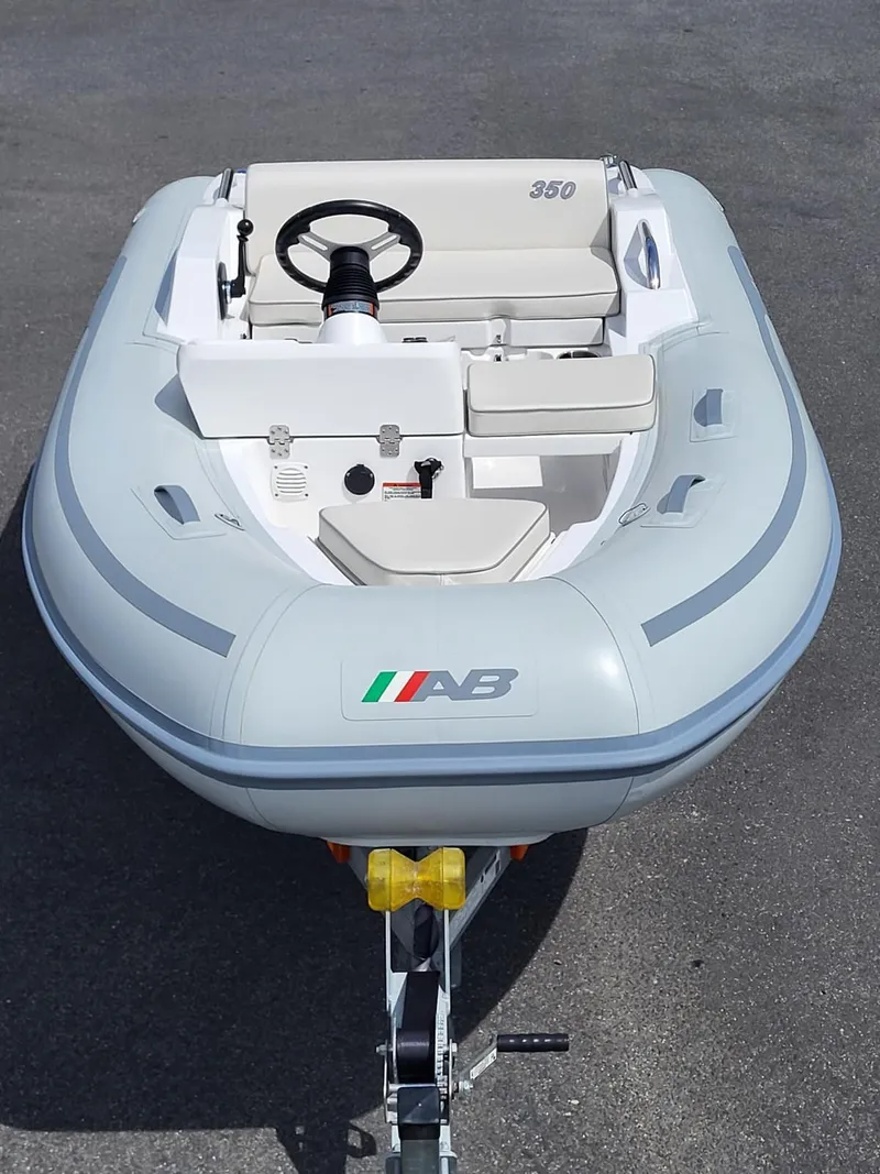 Slide: The Image of 2024 AB Inflatables ABJET 350XP inflatable boat on trailer. - 10