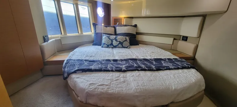 Slide: The Image of Luxurious bedroom interior of 2013 Azimut 45 Flybridge yacht with large bed and windows. - 27
