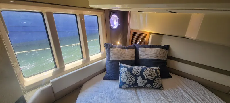 Slide: The Image of Luxurious bedroom interior of 2013 Azimut 45 Flybridge yacht with ocean view windows. - 34