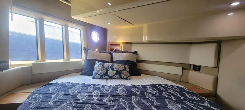 Slide: The Image of Luxurious bedroom interior of 2013 Azimut 45 Flybridge yacht with large windows. - 36