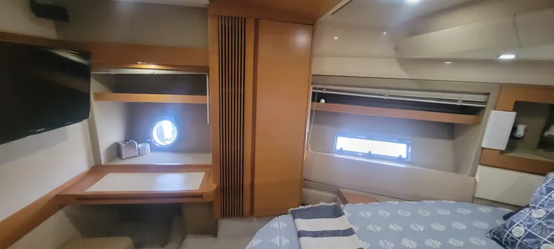 Slide: The Image of Interior cabin of 2013 Azimut 45 Flybridge yacht with desk and bed. - 39
