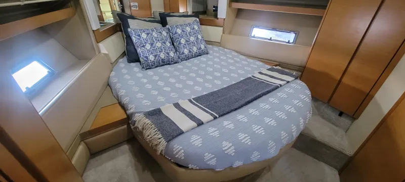 Slide: The Image of Luxurious bedroom in 2013 Azimut 45 Flybridge yacht with cozy bedding. - 41