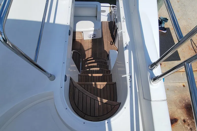 Slide: The Image of Staircase on 2013 Azimut 45 Flybridge yacht with wooden steps and stainless steel railings. - 8