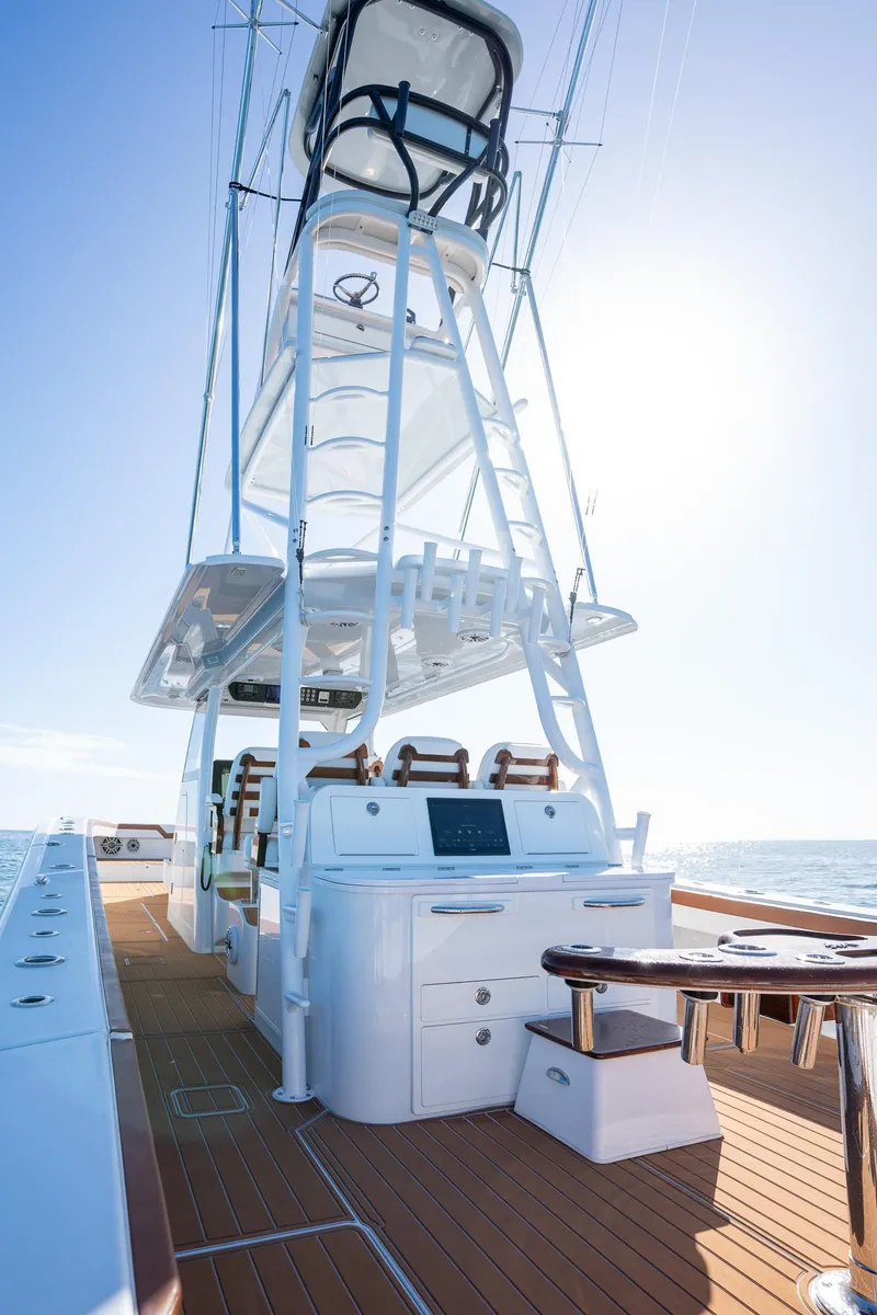 Slide: The Image of 2022 Freeman 47 yacht with modern deck and tower in sunlight. - 20