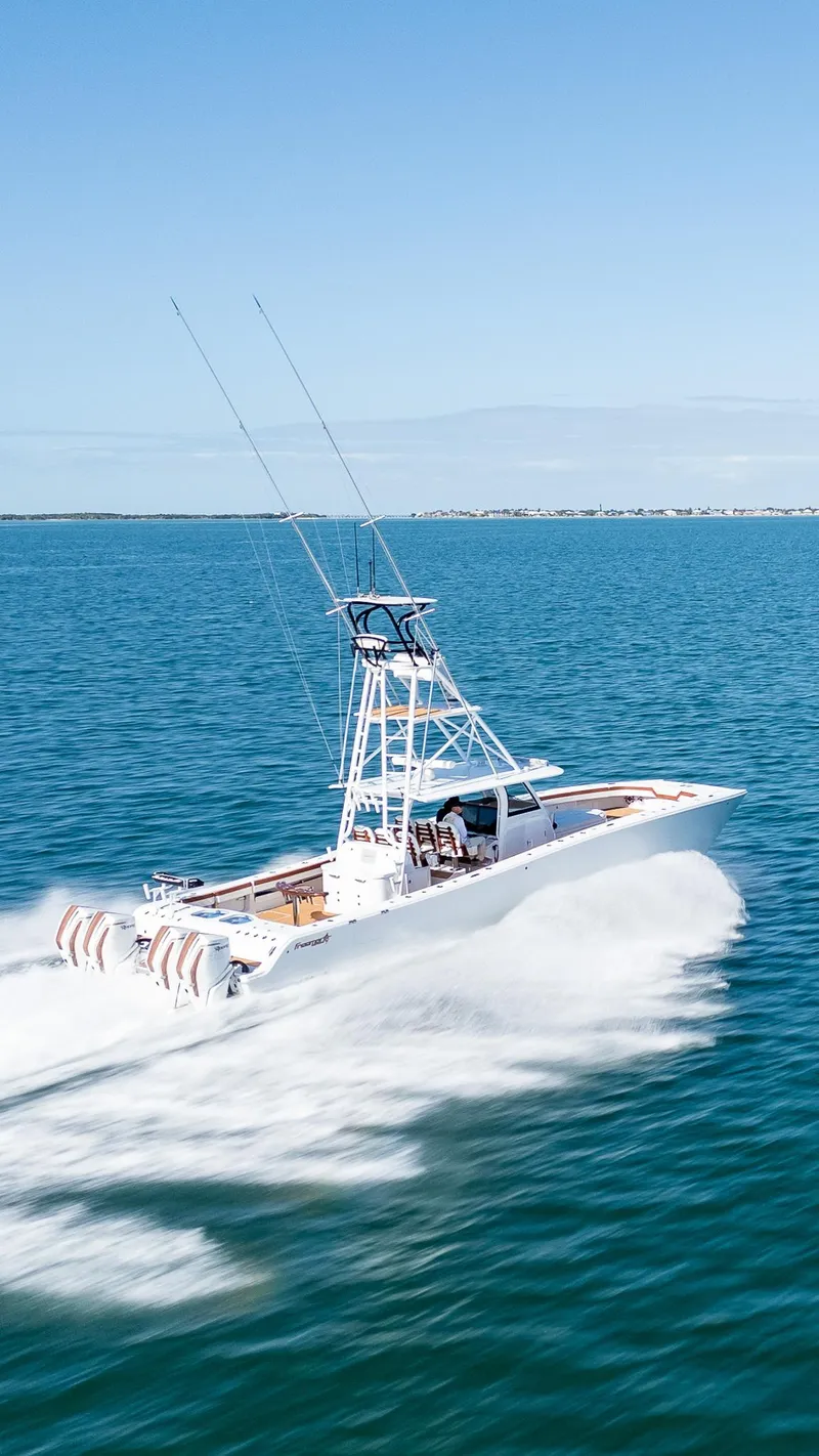 Slide: The Image of Freeman 47 boat cruising on open water, 2022 model. - 3