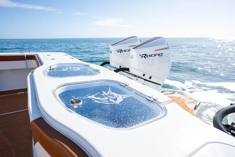 Slide: The Image of Freeman 47 boat 2022 model with twin Racing 450 engines on open water. - 30