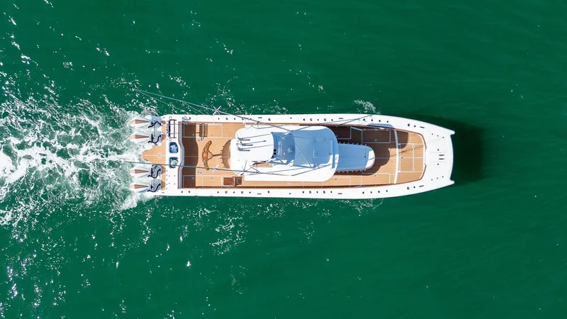 Slide: The Image of Aerial view of 2022 Freeman 47 yacht cruising on green water. - 37