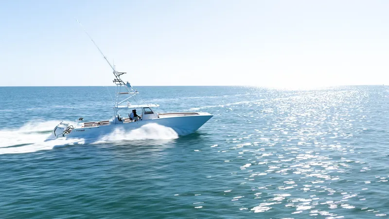 Slide: The Image of Freeman 47 boat cruising on open water, 2022 model. - 38