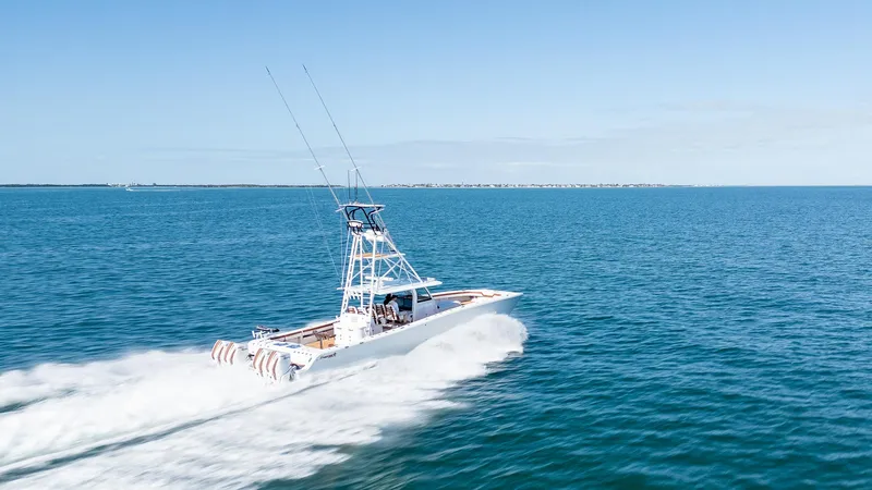 Slide: The Image of Freeman 47 boat cruising on open water, 2022 model. - 39