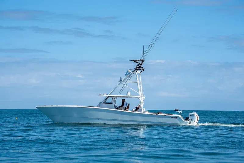 Slide: The Image of Freeman 47 boat cruising on the ocean, 2022 model. - 45