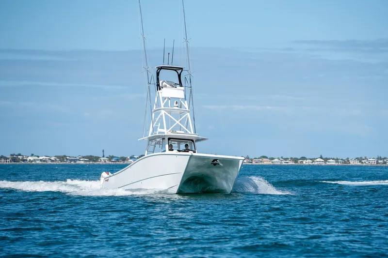 Slide: The Image of 2022 Freeman 47 boat cruising on open water. - 46