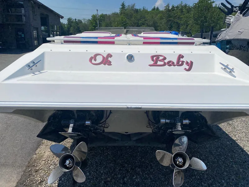Slide: The Image of 1998 Fountain 35 Lightning boat with dual propellers and Oh Baby text on the stern. - 13