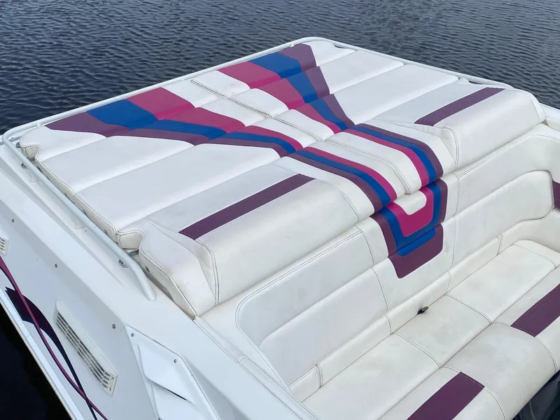Slide: The Image of 1998 Fountain 35 Lightning boat with white and purple upholstery. - 5