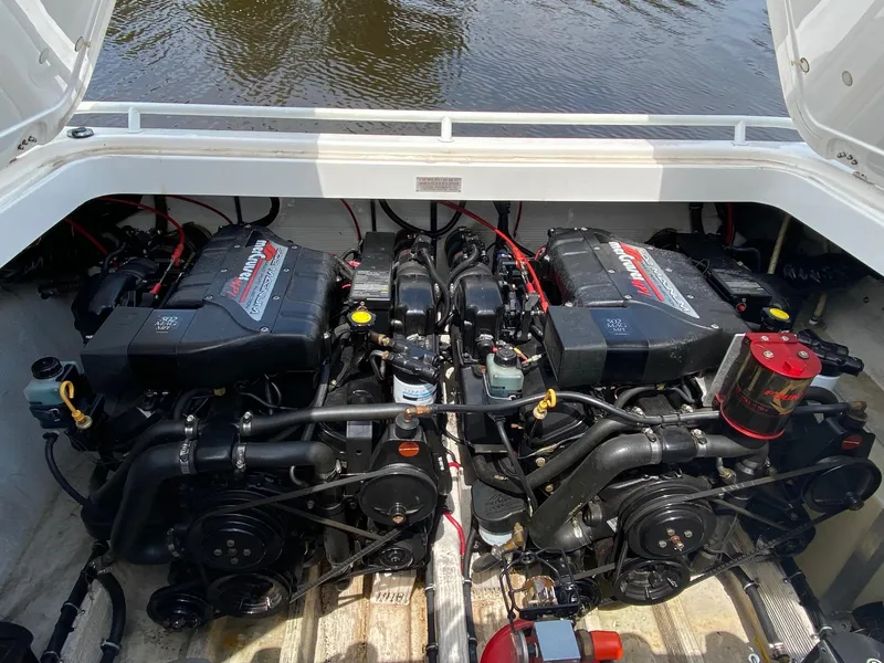 Slide: The Image of Twin engines of a 1998 Fountain 35 Lightning boat. - 9