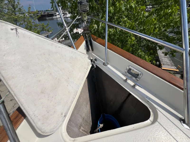 Slide: The Image of Open anchor locker on 1982 Campion C-320 Pilot House boat. - 13