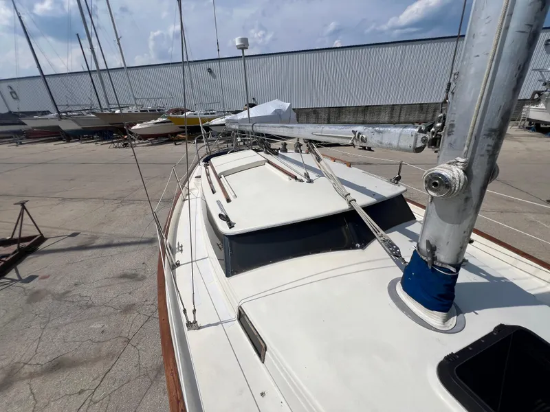 Slide: The Image of 1982 Campion C-320 Pilot House sailboat docked in a marina. - 14