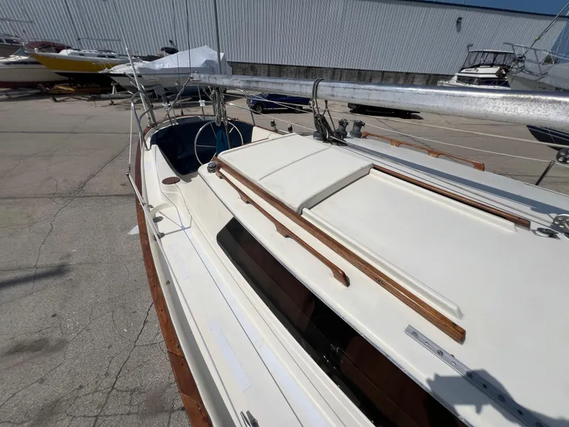 Slide: The Image of 1982 Campion C-320 Pilot House sailboat docked in a marina. - 15