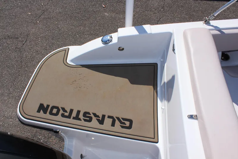 Slide: The Image of 2018 Glastron GT200 boat deck with logo. - 8