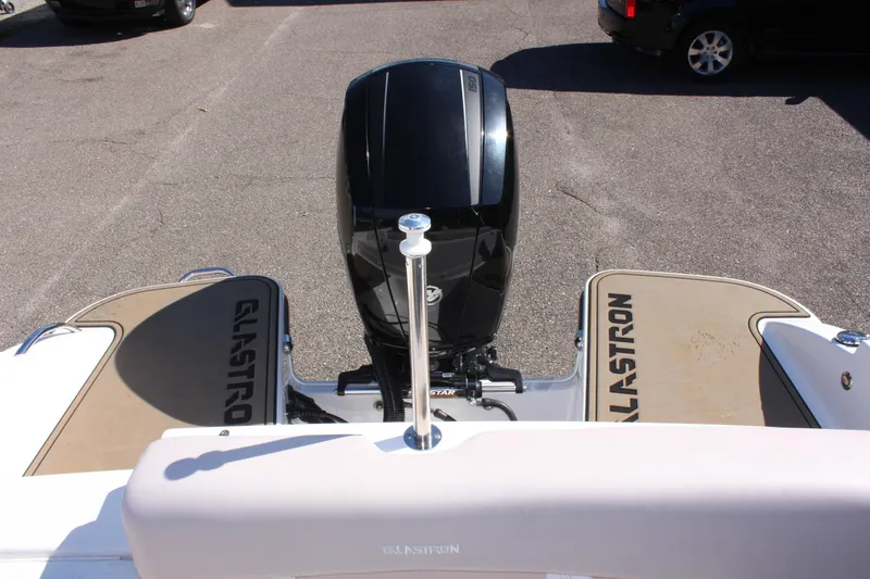 Slide: The Image of 2018 Glastron GT200 boat with outboard motor, rear view. - 9