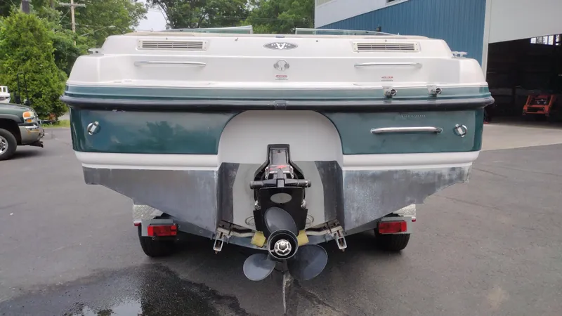 Slide: The Image of 1996 Chaparral 2330 SS boat rear view with outboard motor. - 4