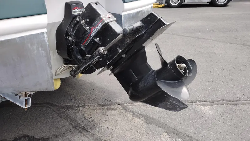 Slide: The Image of Close-up of the outboard motor of a 1996 Chaparral 2330 SS boat. - 5