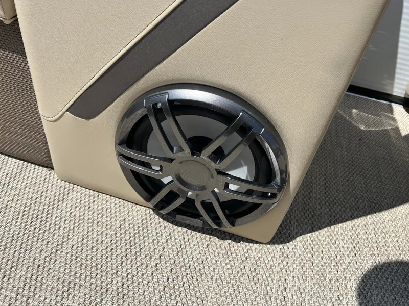 Slide: The Image of Speaker on 2024 Crest Classic Platinum 240 SLC boat, beige interior. - 13