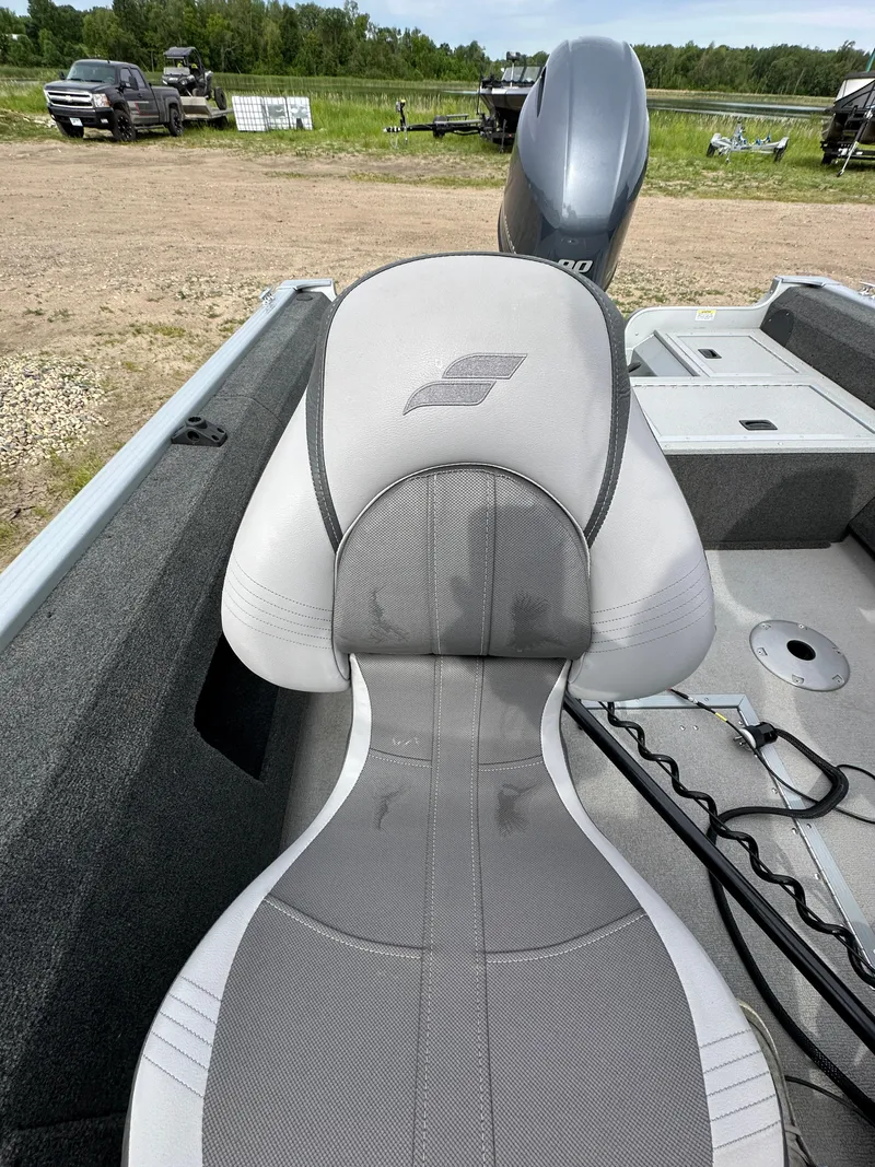 Slide: The Image of 2022 Starcraft Renegade 168 DC boat seat and interior view. - 3