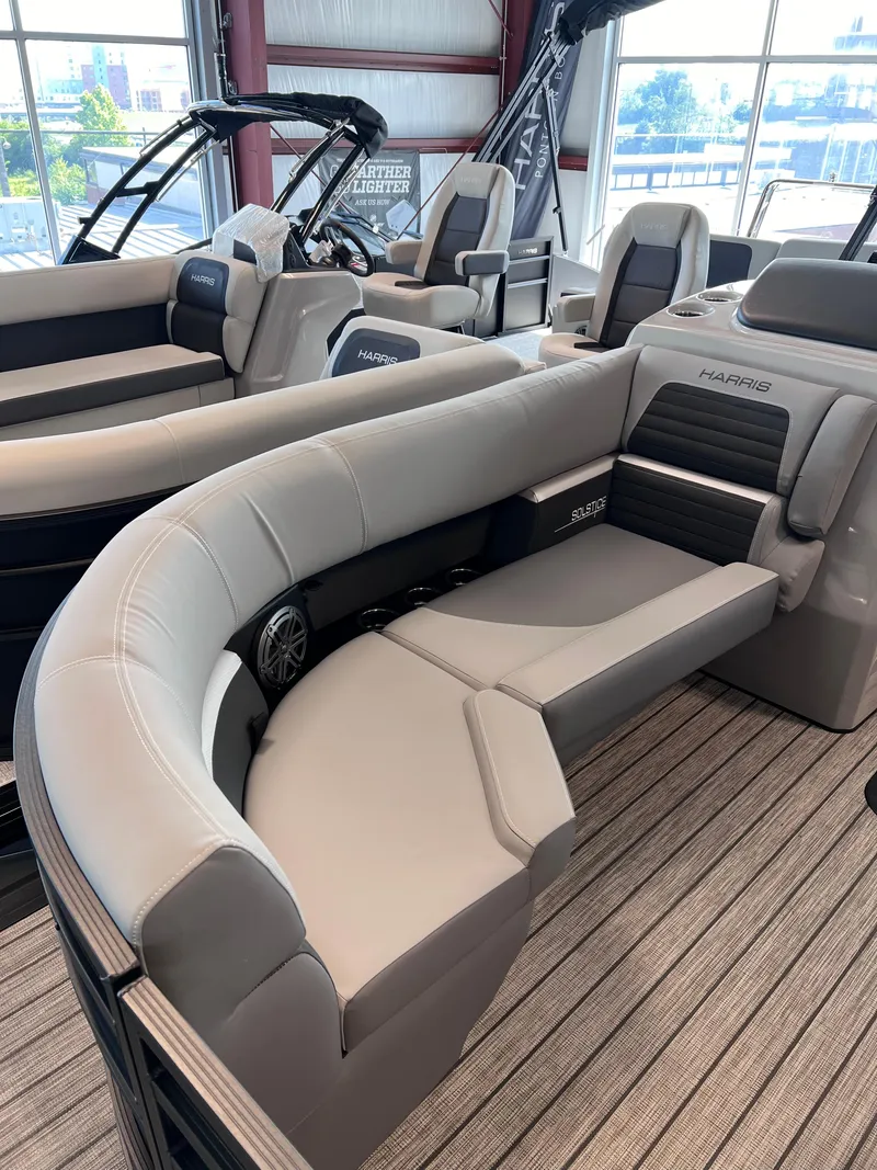 Slide: The Image of 2024 Harris Solstice 230 pontoon boat interior with luxurious seating. - 10