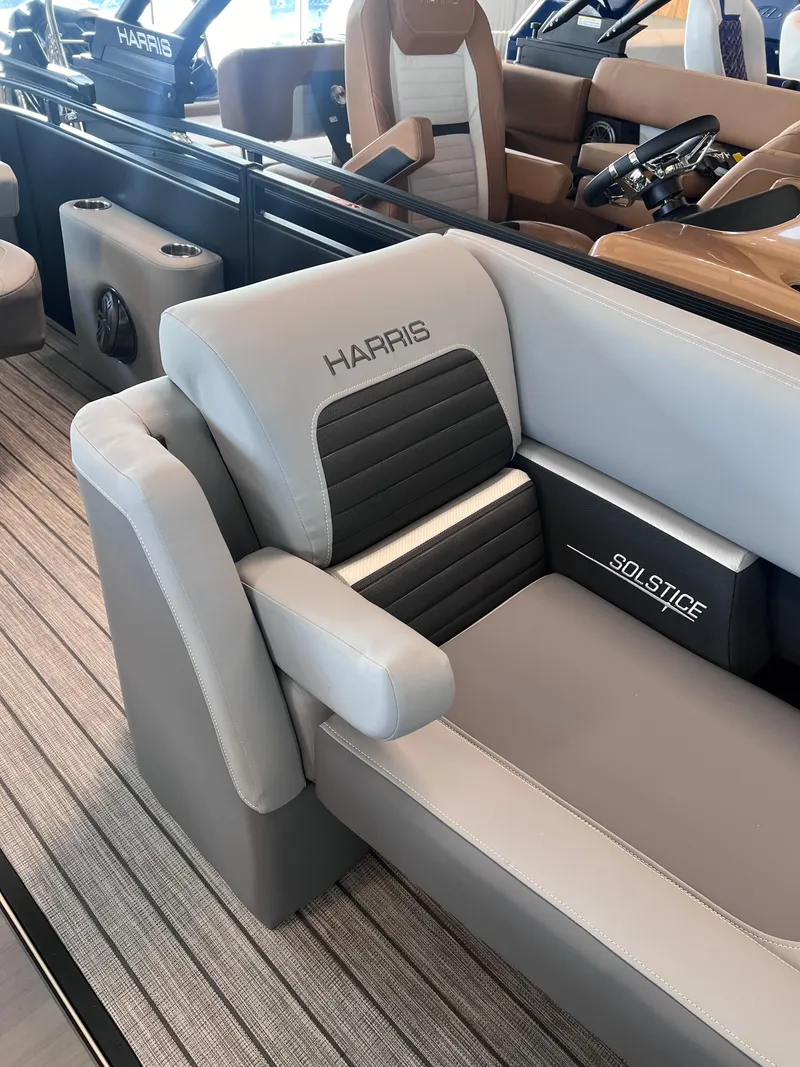 Slide: The Image of 2024 Harris Solstice 230 boat interior with luxurious seating. - 13