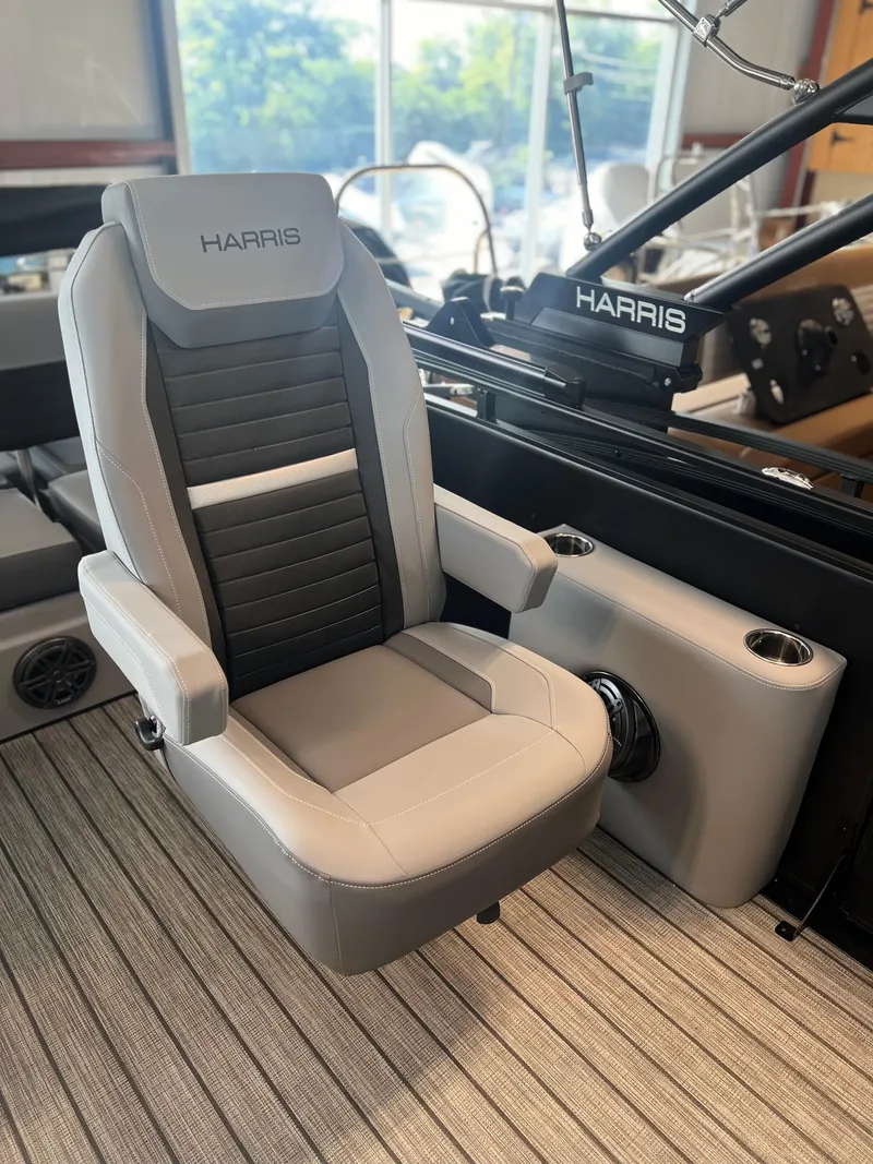 Slide: The Image of 2024 Harris Solstice 230 boat captain's chair in a luxurious interior. - 15
